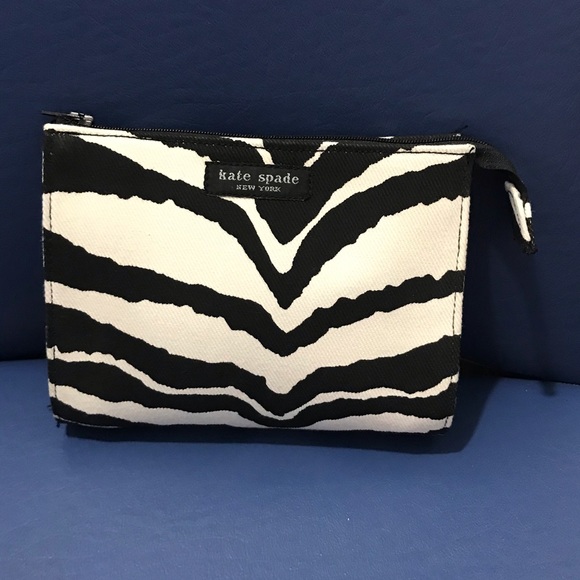 kate spade Handbags - KateSpade zebra sm cosmetic bag/clutch